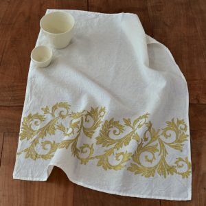 han crafted tea towel gold