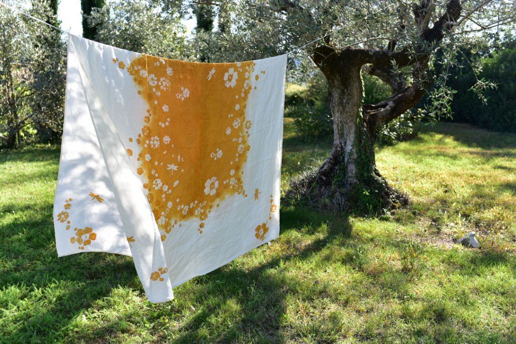 Linen tablecloth drying on the line in the outside