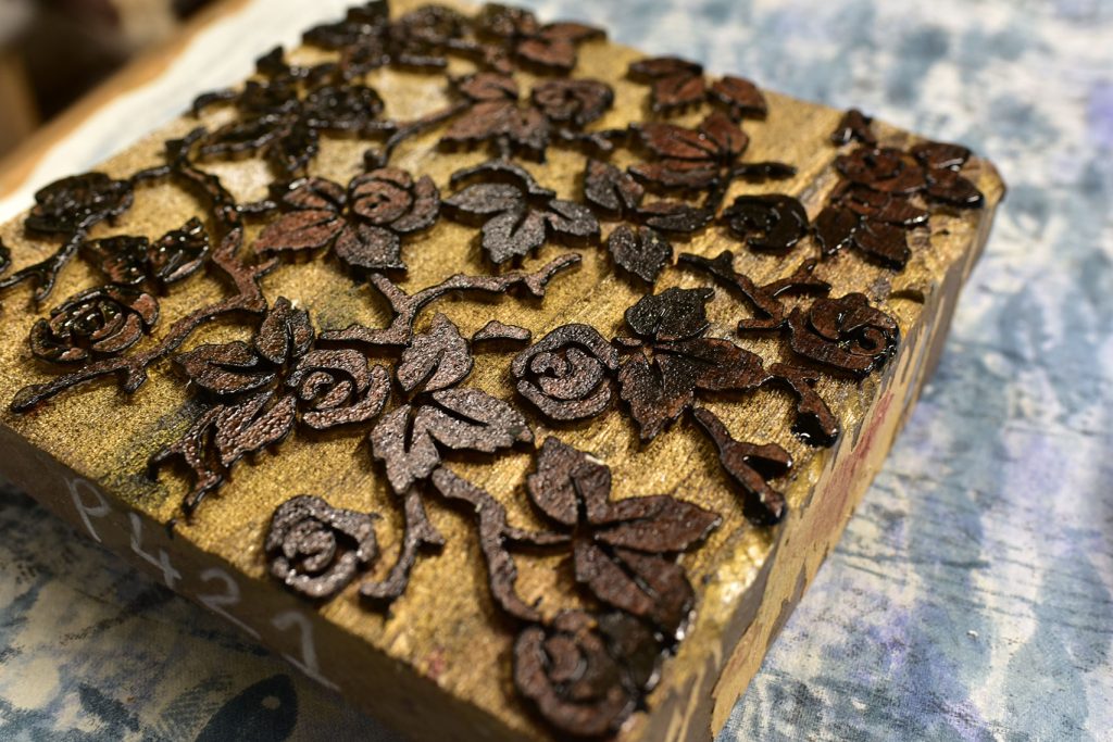 wood block used to decorate the linen