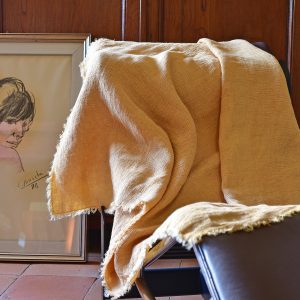 Waffle Throw - Hand-painted Linen Throw - Mustard - Throw draped over indoor chair