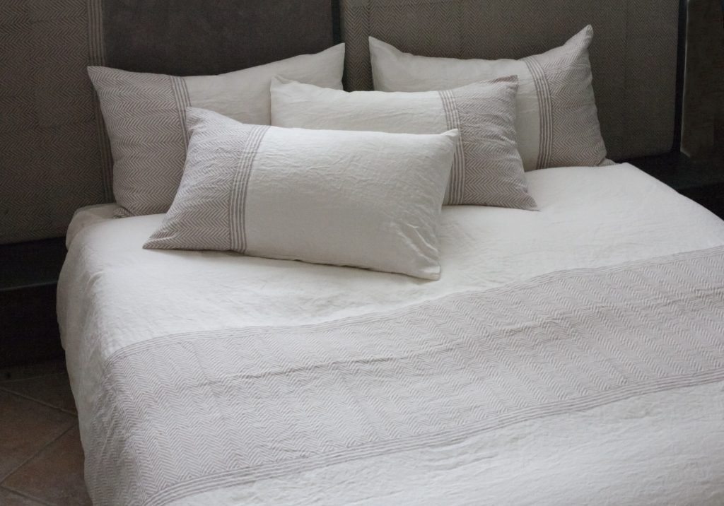 luxury bedroom with luxurious handmade bedlinen