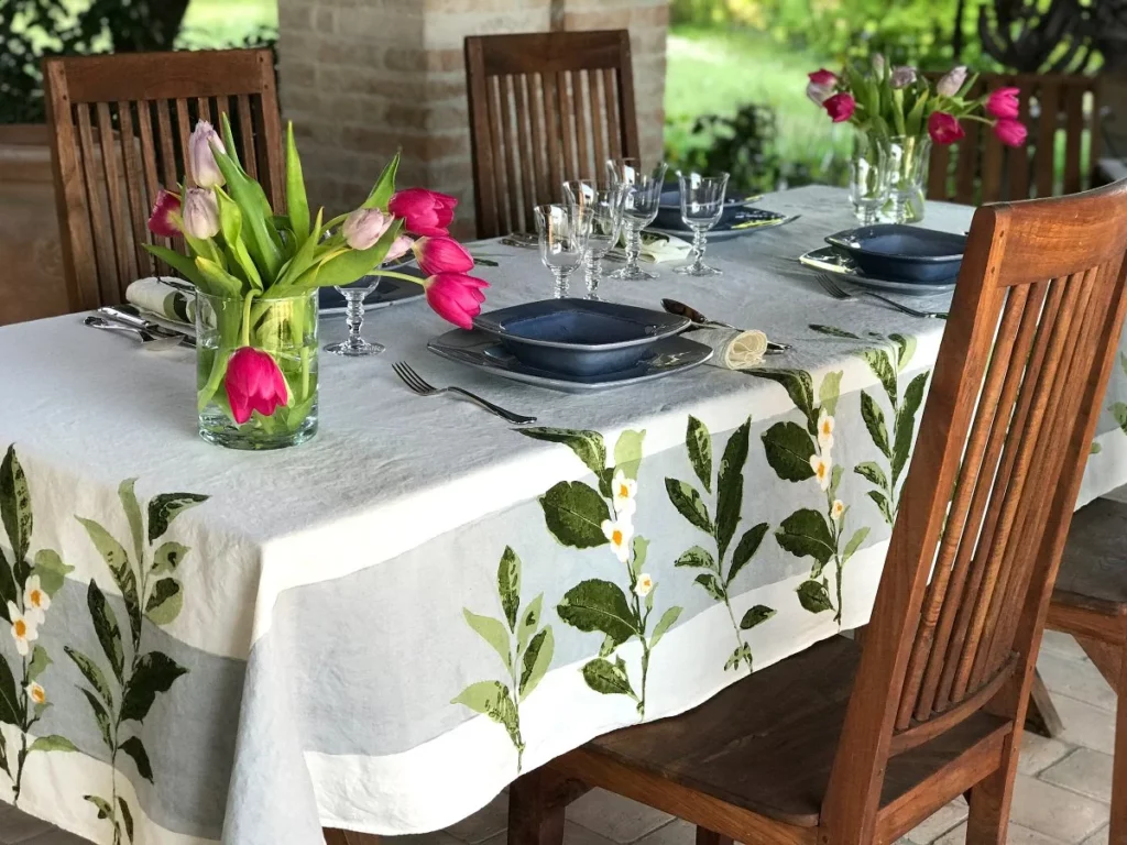 beautiful outdoor tables cape setting in the shade of a pergola