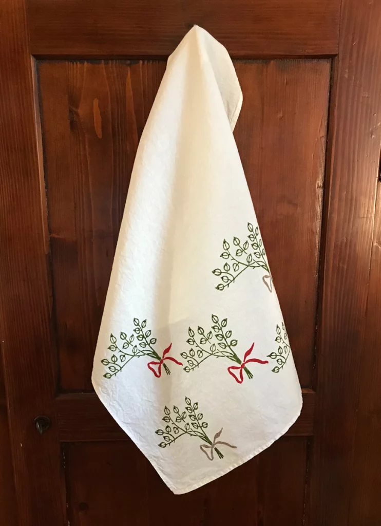 Fiocco towel hanging from door handle