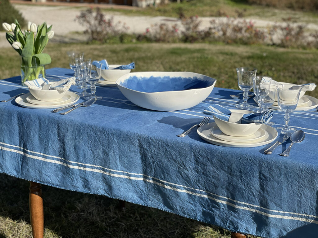 Blue linen tablecloth for alfresco dining event