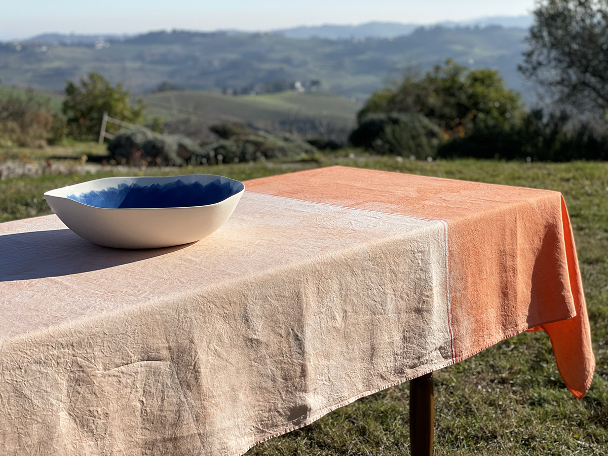 https://www.allorashop.com/wp-content/uploads/2022/03/Hand-painted-linen-tablecloth-orange-6.jpg