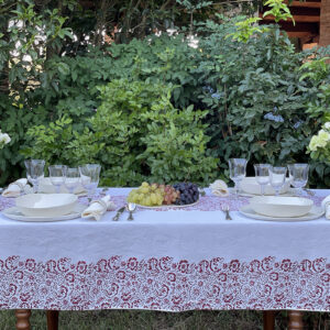 Hand-painted Italian tablecloth in a traditional floral motif