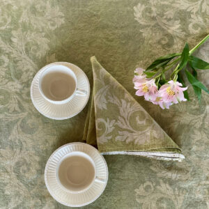 green runner with a napkin folded on top