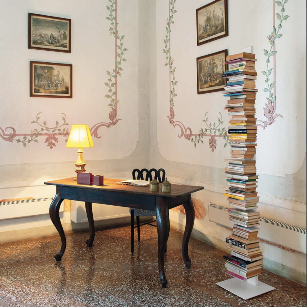 Italian design bookcase near a classic wood words