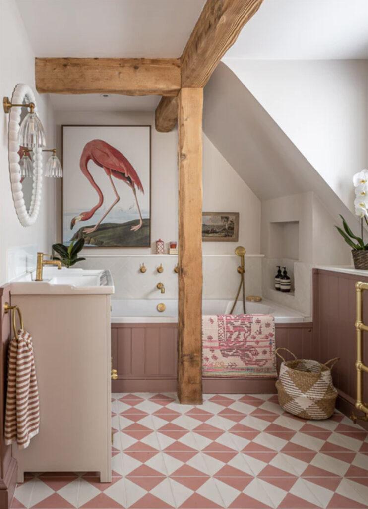 peachy fuzz tiled floor in a muted bathroom with a flaming print on the wall