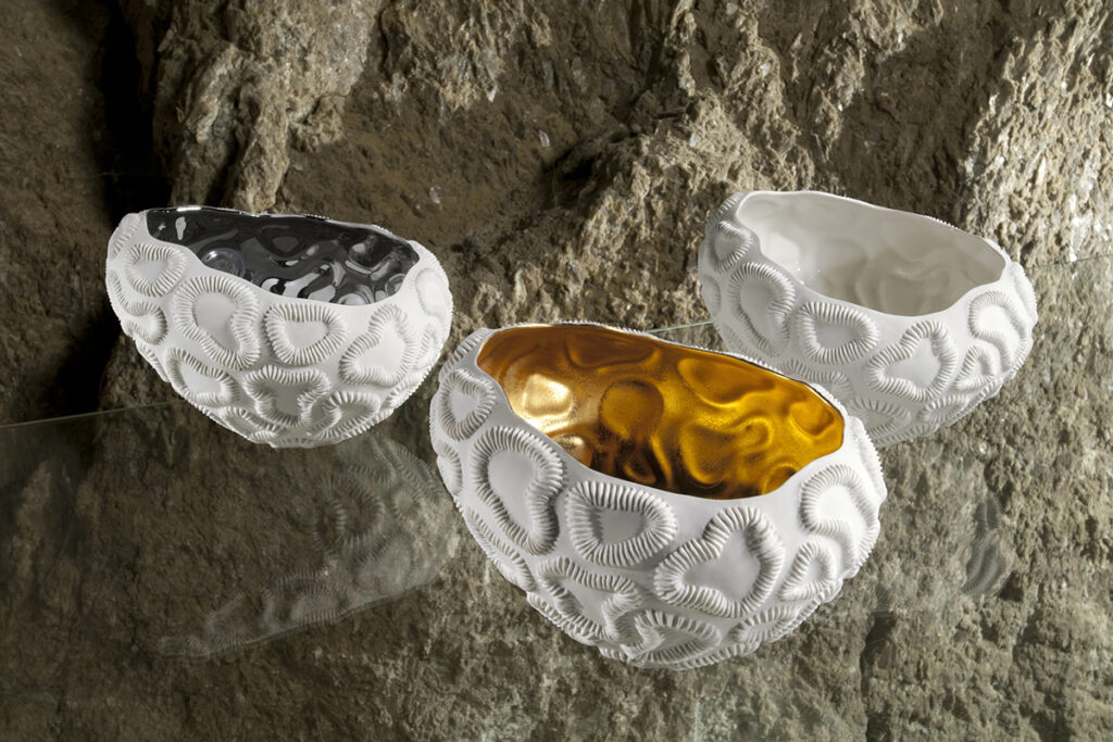 Italian Handmade porcelain bowl laid on o crystal table