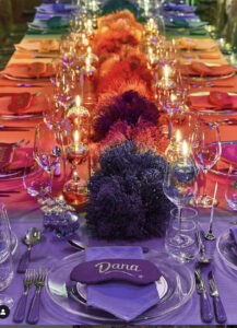 colourful table settings from deep purple hues to orange colour