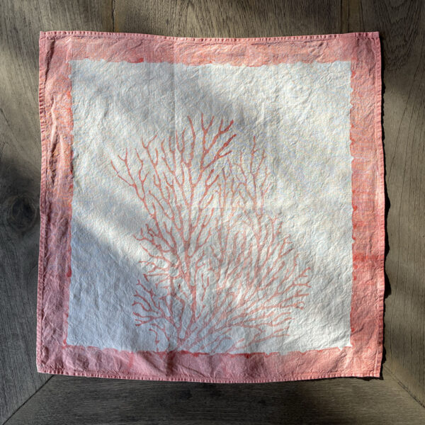 handmade italian linen napkin featuring a coral motif