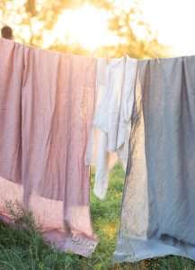 natural textiles hanging to dry