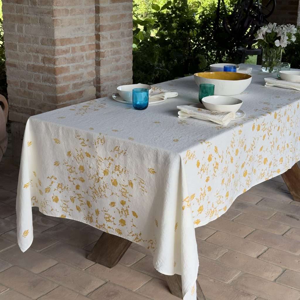 block-printed organic linen tablecloth with yellow leaves