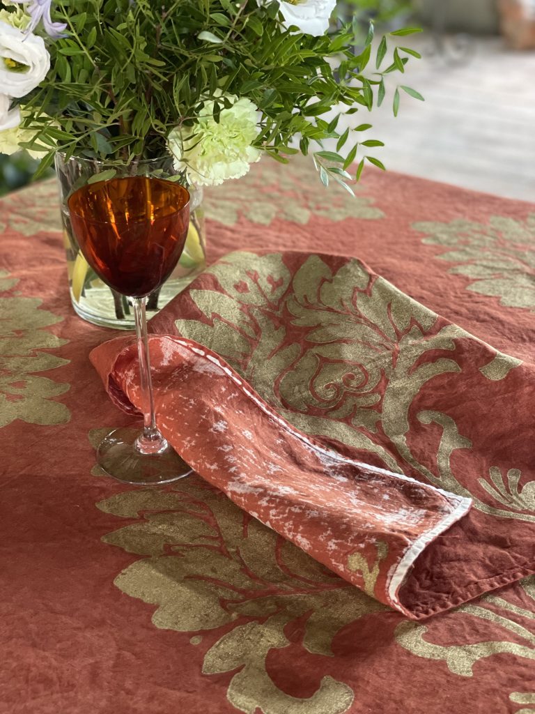 reverse bleeding effect of hand-stamped fabric