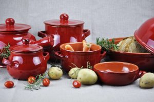 Italian Ceramic cookware laid on table with vegetable