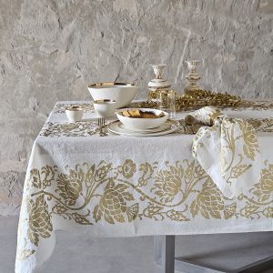 Luxury linen tablecloths hand-printed in traditional gold thistle motif