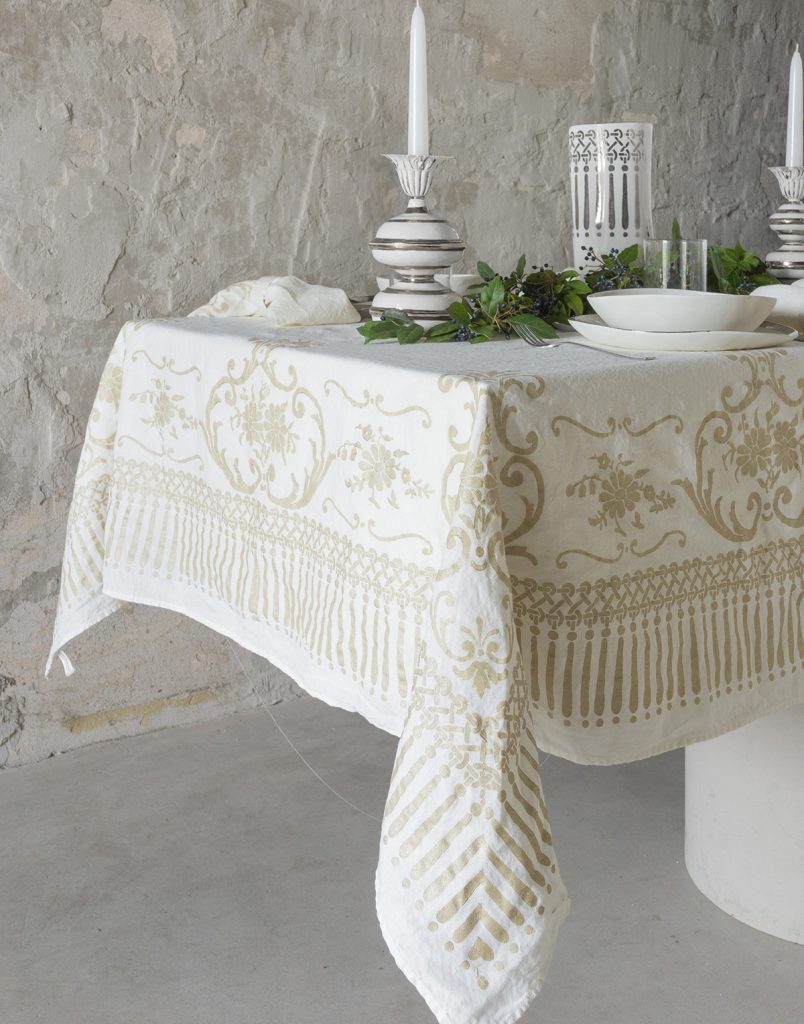 Festive linen tablecloth in gold classic design